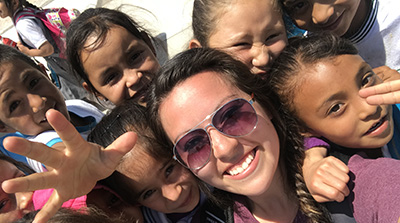 Student with kids in Mexico